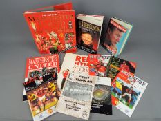 Manchester United - A collection of Manchester United related books, match programmes and similar.