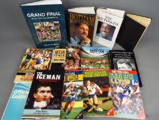 A collection of sporting interest books predominantly relating to Rugby League.
