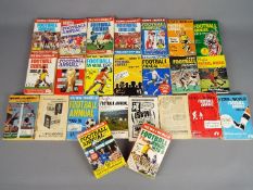 A collection of 24 various Football Annuals, 1950's and later.