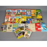 A collection of 24 various Football Annuals, 1950's and later.