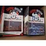 Manchester United - a collection in excess of 180 home match programmes,