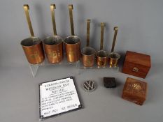 A mixed lot of collectables to include a set of six copper measuring cups, trinket boxes,