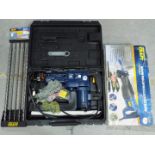 A Powercraft 850W concrete breaker, in case, masonry drill bits and an 850W reciprocating saw,