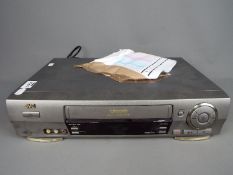 A JVC Hi Fi VHS Video Cassette Player / Recorder, model HR-J665 B.E.S.T Picture System.