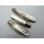 Three George V silver and mother of pearl folding fruit knives, all Sheffield assay,