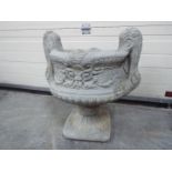Garden Stoneware - A large reconstituted stone two handled decorative urn planter in two pieces