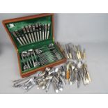 A canteen of Viners stainless steel cutlery and a quantity of loose cutlery, plated and stainless.