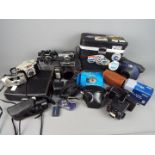 Photography - A collection of cameras and photographic equipment to include Olympus, Kodak,