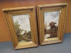 A pair of ornately framed oils on canvas depicting rural scenes, signed by the artist lower left E.