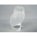 Lalique - A Lalique frosted and clear glass model depicting an owl, signed, approximately 9 cm (h).