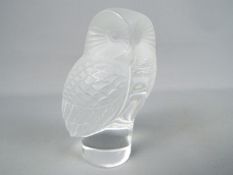 Lalique - A Lalique frosted and clear glass model depicting an owl, signed, approximately 9 cm (h).