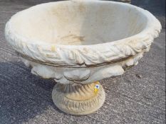 Garden Stoneware - A large reconstituted stone Acanthus urn decorated with acanthus leaves in two