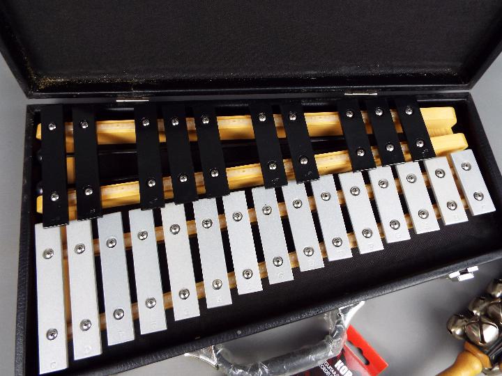 A cased tenor alto glockenspiel, tin whistle, sleigh bells and similar. - Image 3 of 3