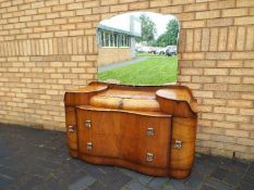 A 1960's dressing table with five drawers and large mirror by Supersuite Production,