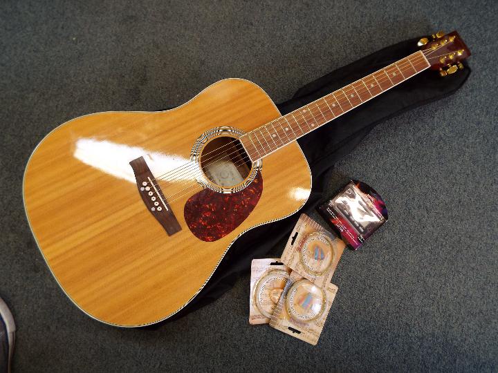 A C. Giant acoustic guitar with soft case and Seiko digital tuner.