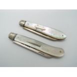 Two George V silver and mother of pearl folding fruit knives,