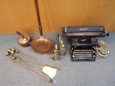 A vintage Imperial typewriter and a collection of metalware including brass fire dogs with ball and