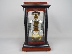 A Sewills of Liverpool skeleton type brass mantel clock with Hermle movement numbered 791-081,