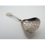 A George III hallmarked silver caddy spoon, Birmingham assay 1814, makers mark for William Pugh,