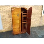 A 1960's gentleman's wardrobe with fitted interior by Supersuite Production,