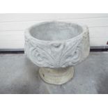 Garden Stoneware - A reconstituted stone Fleur De Lis urn garden planter depicting the stylized 3