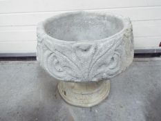 Garden Stoneware - A reconstituted stone Fleur De Lis urn garden planter depicting the stylized 3