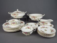 Royal Albert - a dinner service decorated in the Moon Rose pattern