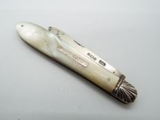 A Victorian silver and mother of pearl folding fruit knife,