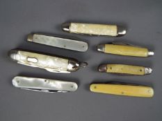 A collection of vintage penknives of varying size, largest approximately 9 cm (l) when closed.