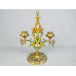 A 19th century French gilt bronze and champlevé enamel, twin branch candelabra,