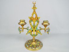 A 19th century French gilt bronze and champlevé enamel, twin branch candelabra,