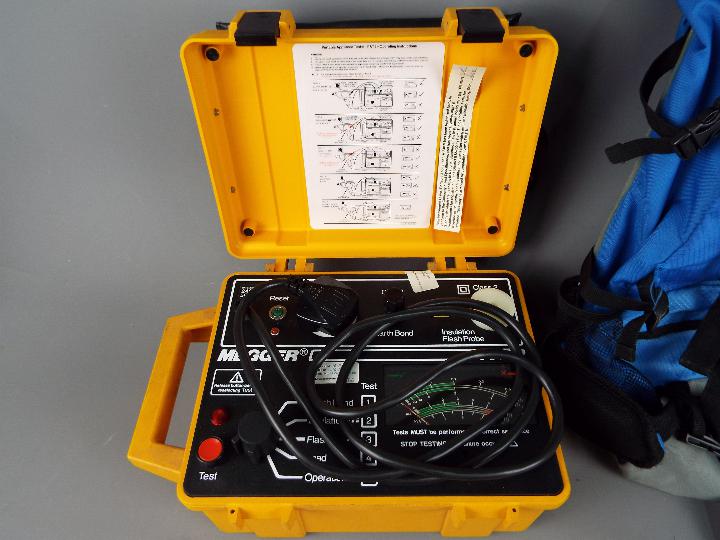 A Megger Pat2 appliance tester and a rucksack. - Image 2 of 2
