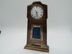 A small silver cased Art Nouveau style desk clock or watch,