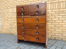 A chest of four over four drawers, approximately 107 cm x 79 cm x 52 cm.