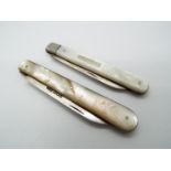 Two George V silver and mother of pearl folding fruit knives,