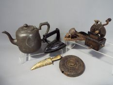 A mixed lot of collectables to include a vintage 'Automatic Pencil Sharpener', tape measure,