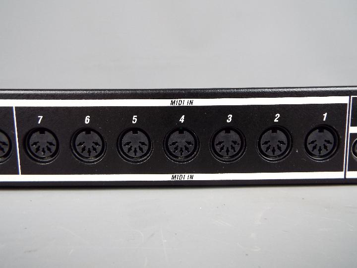 A MOTU Midi Express 8 x 8 128 Channel Midi Interface - Image 9 of 9
