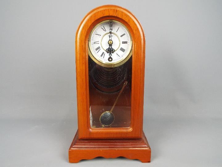 Three clocks to include a Brevete travel alarm clock, a Metamec mantel clock and similar. - Image 8 of 10
