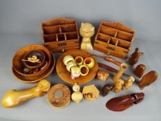 A collection of treen, desk tidies, bowls and similar.