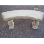 Garden Stoneware - A reconstituted stone garden bench with a curved seat and plinths in the form of