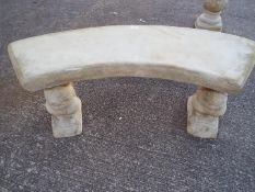 Garden Stoneware - A reconstituted stone garden bench with a curved seat and plinths in the form of