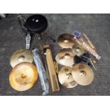 A quantity of drumming related equipment to include stool, hi-hat, cymbal stand,