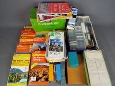 A collection of photographic slides and a quantity of Ordnance Survey maps.