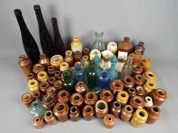 A collection of stoneware and glass bottles and pots, early to mid 20 th century, - Image 2 of 4