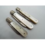 Three George V silver and mother of pearl folding fruit knives, all Sheffield assay,
