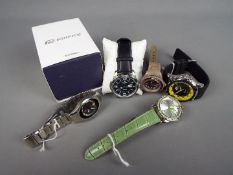 Five wristwatches to include a Casio Edifice (in original box with outer card sleeve),