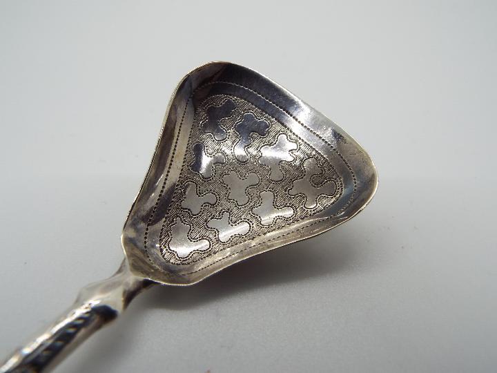 A George III hallmarked silver caddy spoon, Birmingham assay 1814, makers mark for William Pugh, - Image 3 of 3