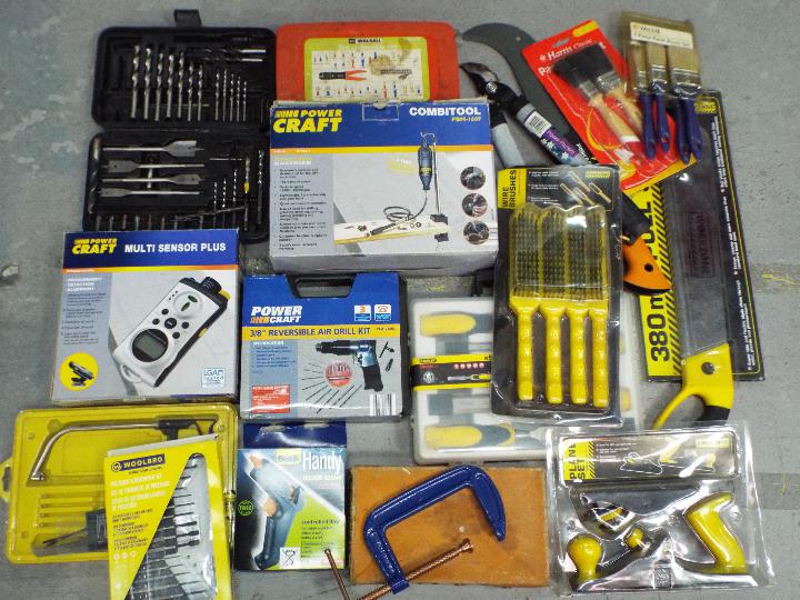 Various tools to include combitool, multi sensor, air drill kit, hand tools and similar.