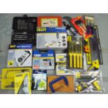 Various tools to include combitool, multi sensor, air drill kit, hand tools and similar.