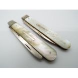 Two Victorian silver and mother of pearl folding fruit knives,
